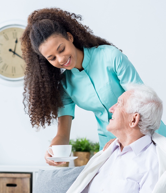 female caregiver assisting senior