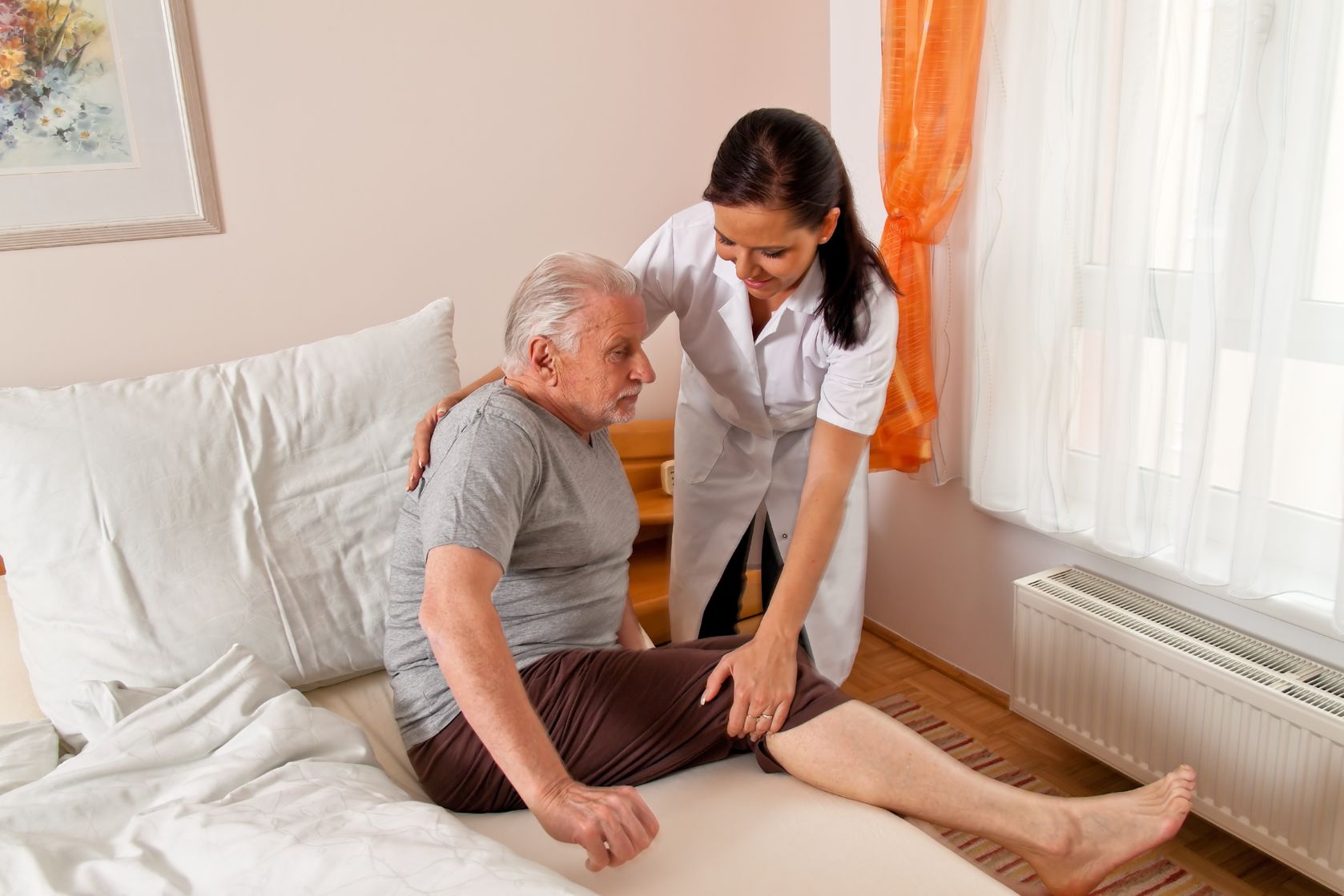 caregiver assisting senior