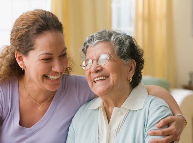 mother and daughter hugging at the assisted villas