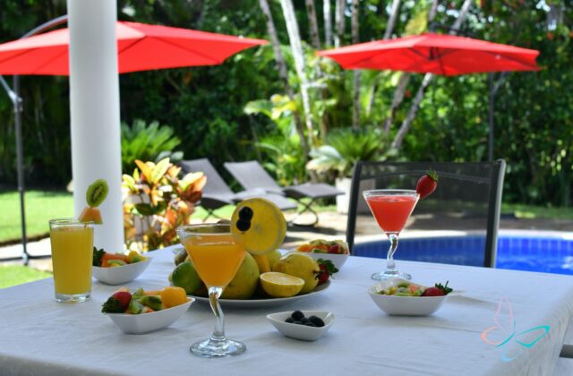 Fruit and cocktails near the pool